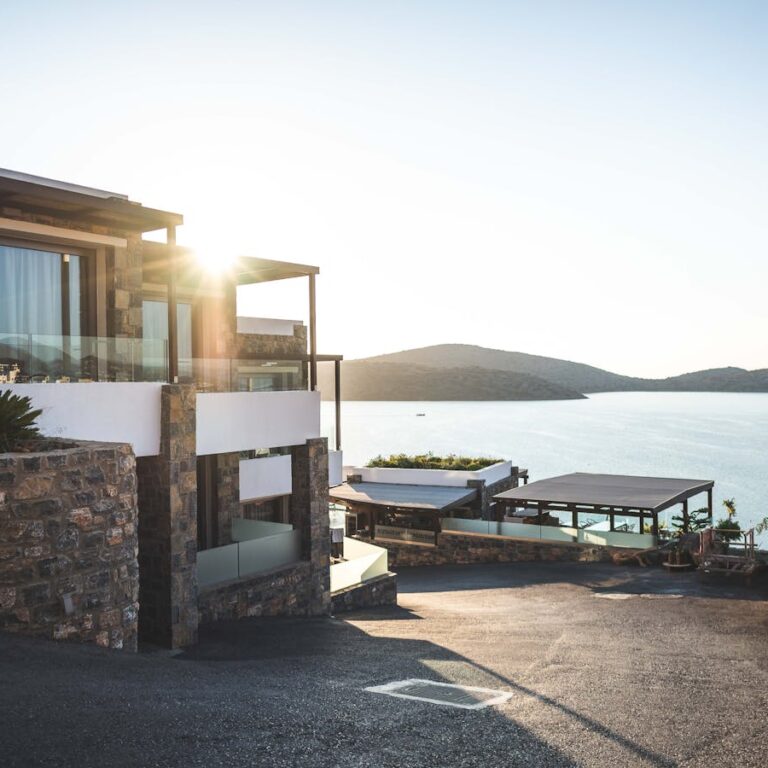 Elegant modern house by the lake with stunning sunrise view. Ideal real estate.